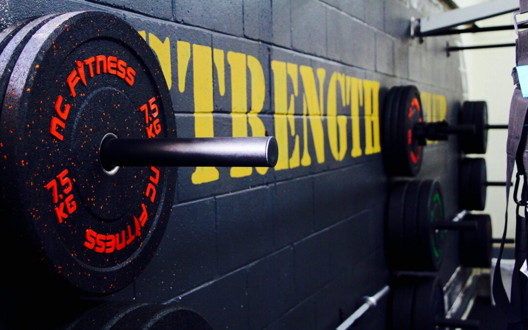 Hantelscheiben an der Wand